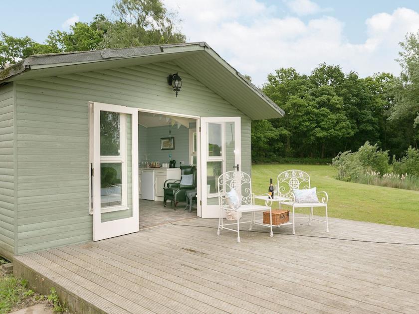 Sit out on the decking and enjoy a glass of wine | Yokefleet Cottage, Sandholme, near Beverley