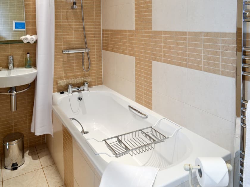 Bathroom with shower over bath | The Pavilion, Killerby, near Scarborough