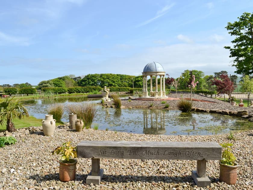 Seating by the lake | The Pavilion, Killerby, near Scarborough