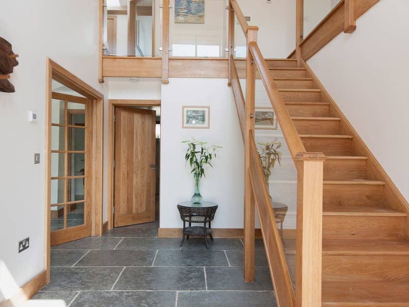 Grand hallway with feature oak staircase | Blackdown Farm, Manor Barn, Blackawton, nr. Dartmouth
