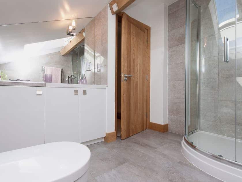 Roomy shower room with sloping ceiling | Blackdown Farm, Manor Barn, Blackawton, nr. Dartmouth
