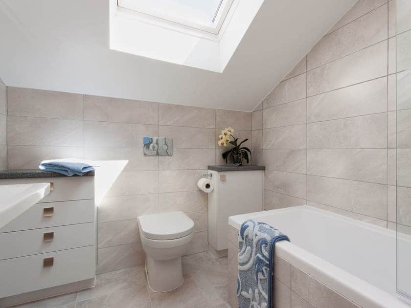 The bathroom is bright, light and has a contemporary feel | Blackdown Farm, Manor Barn, Blackawton, nr. Dartmouth