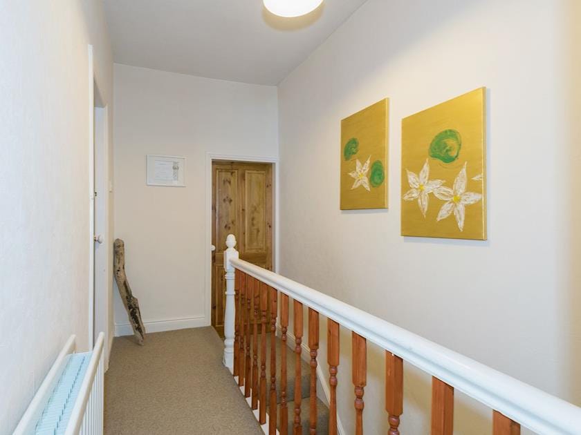 Bright landing area leading to bedrooms | Lazy Cottage, Haverigg, near Millom
