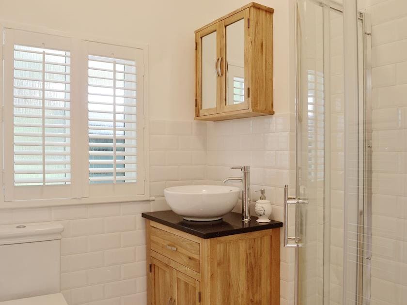 The cottage has a compact shower room | The Mews - Lakeview Cottages at Mondhui, Port of Menteith