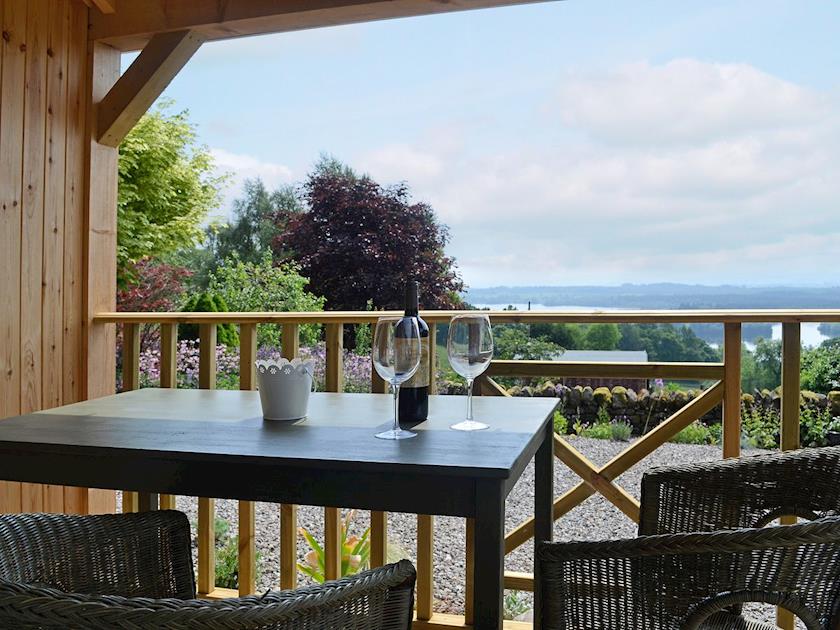 Sheltered outdoor eating area with wonderful views | The Stable - Lakeview Cottages at Mondhui, Port of Menteith