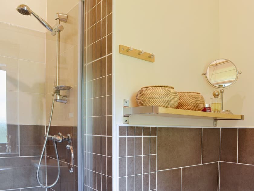 The en-suite is beautifully tiled | Rowanburn Lodge, Greystoke, near Penrith