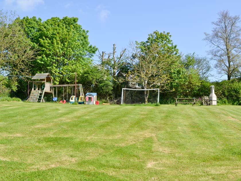 Garden and play area | Owl - Talehay Cottages, Pelynt, near Looe