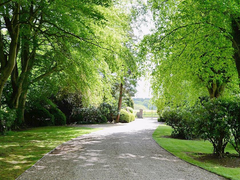 The cottage is hidden away at the foot of a long driveway with parking for two cars | Dunlappie Lodge, Edzell, near Brechin
