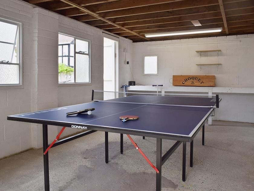 Table tennis in the garage games room | Stourcliffe House, Bournemouth