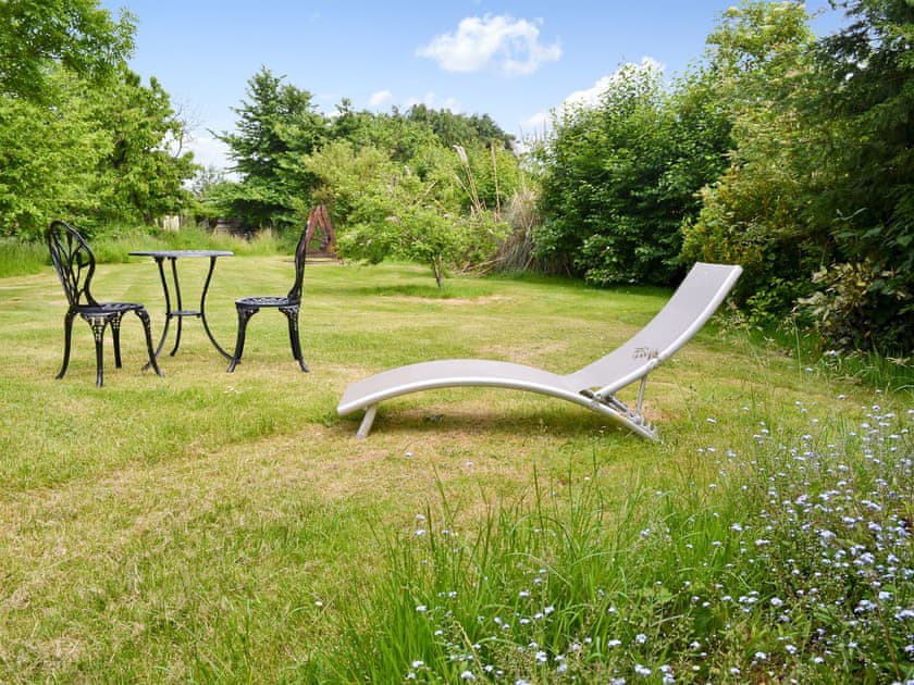 Garden with seating | The Hideaway - The Wheelwrights Post, Burgate, near Fordingbridge