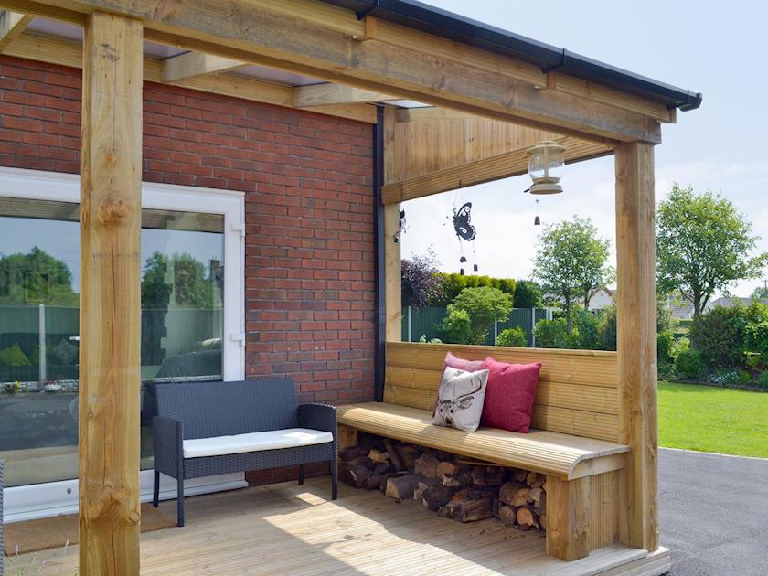 Seating area within covered terrace | Hillcrest House, Brown Edge, near Leek