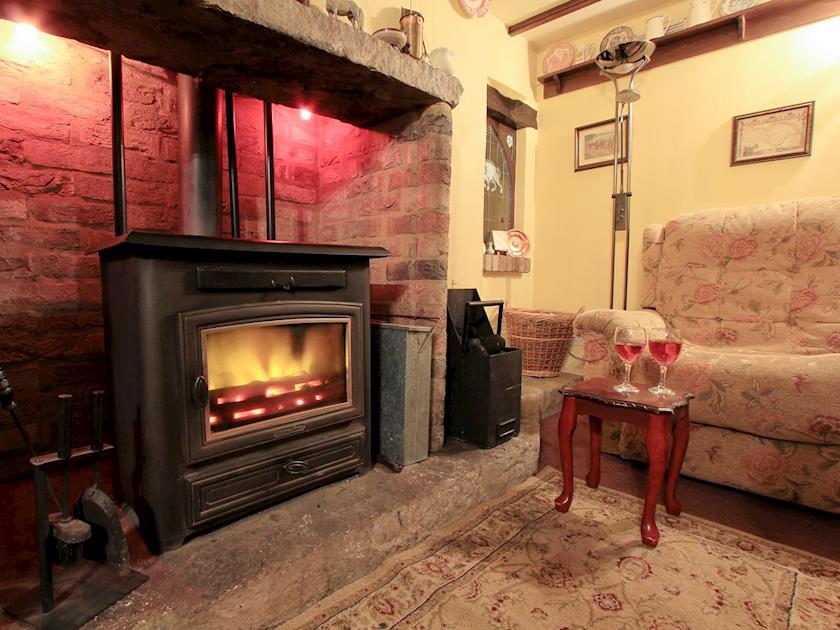 Living room with multi-fuel stove and exposed beams | Stonecroft, Middleham, near Leyburn
