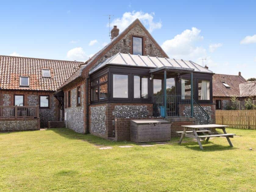 Traditional brick and flint barn converted into a beautiful holiday cottage | Sky Lark, Weybourne