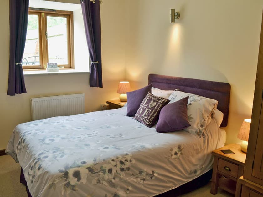 Comfortable bedroom with double bed and single bed | Blackthorn Cottage, Swan Pool, near Falmouth