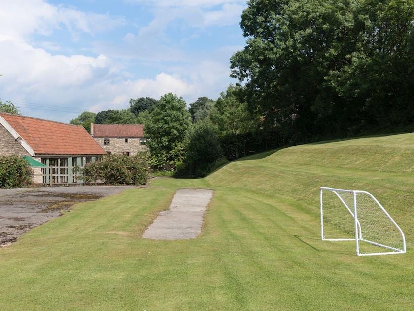 Flat and terraced areas of lawned garden | Bramble Cottage, Foxcote, near Radstock