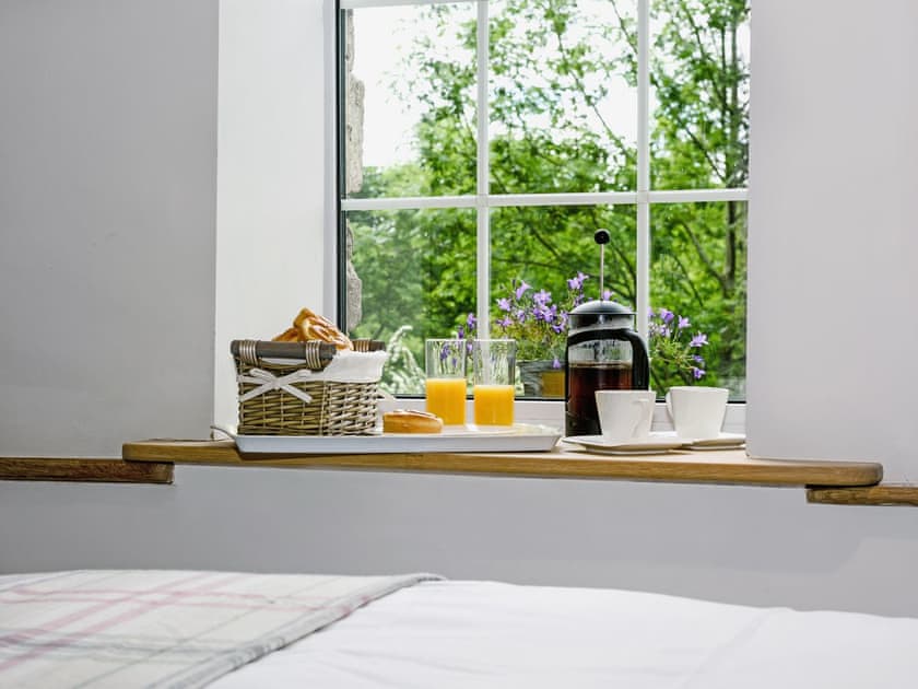 Luxurious split level room with beams, king size bed and wood burner  | The Old Mill, Great Strickland near Penrith