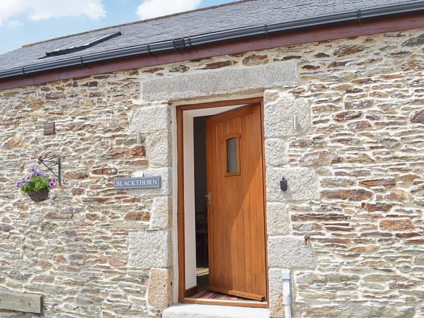 Delightful, single-storey stone barn conversion | Blackthorn Cottage, Swan Pool, near Falmouth
