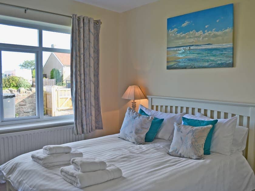 Comfortable double bedroom with kingsize bed | Wayside, Beadnell