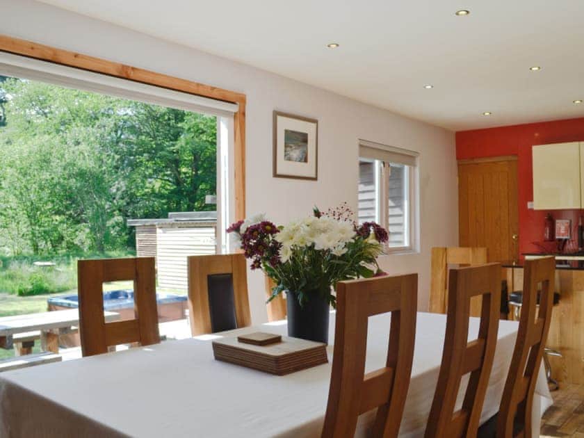 Kitchen/ dining area with doors to the garden | The Ranch, Glen Massan, near Dunoon