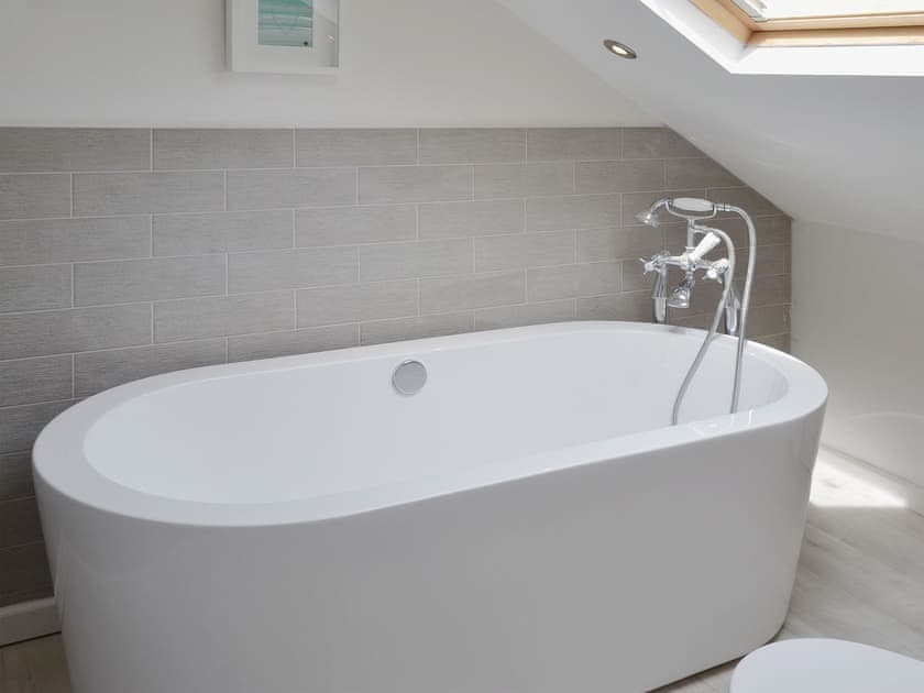 Contemporary standalsone bath in the en-suite | Abbeydale Town House, Whitby
