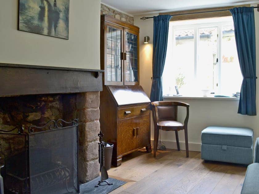 Homely living/dining room with beams and open fire | Yeomans Cottage, Wells