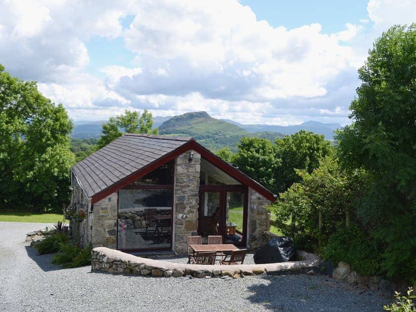 The elevated position of the cottage gives it fantastic views over the Welsh countryside | The Stables - Tyddyn Iolyn, near Criccieth