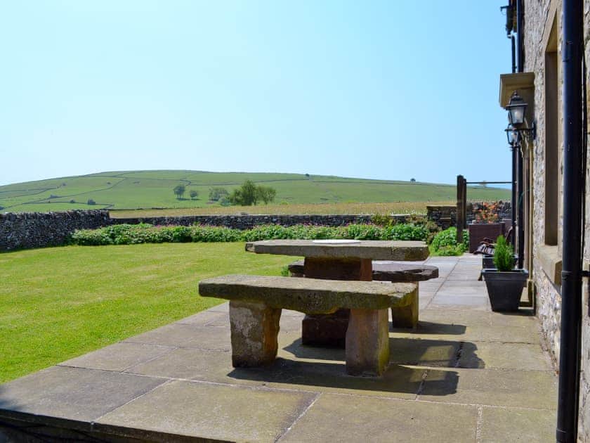 Spacious garden with sitting-out-area | The Farmhouse - Cotterill Farm, Biggin by Hartington, near Buxton