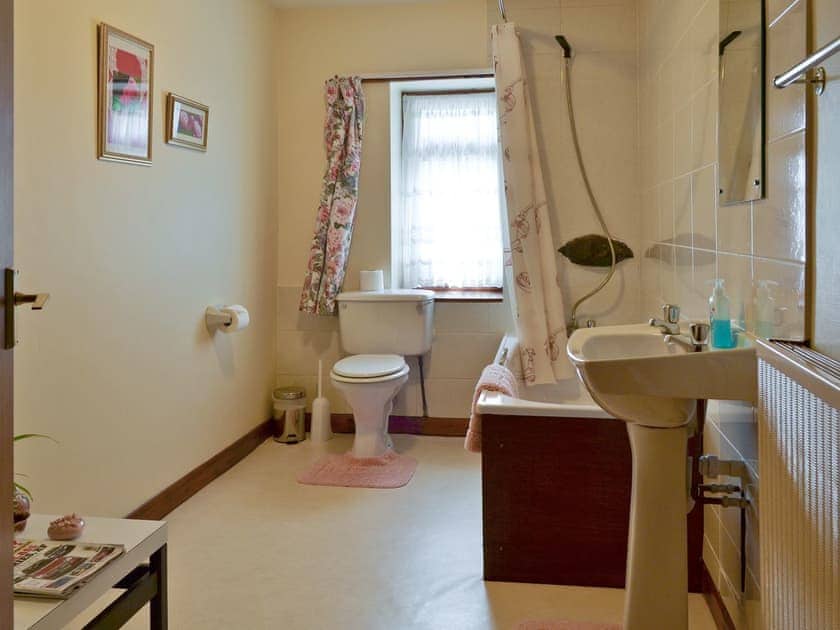 Family bathroom with shower over bath | Bellegrove Cottage, Watermillock, Ullswater