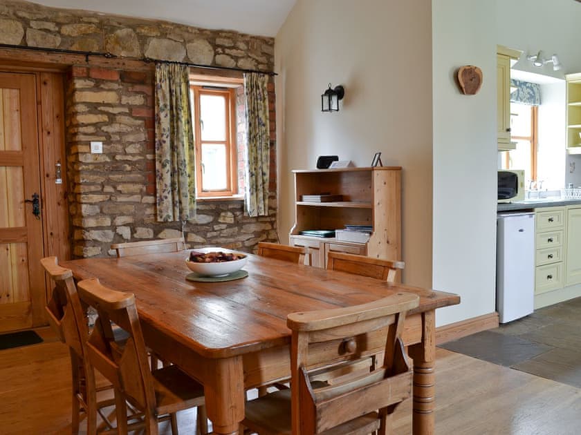 Dining area | The Stables - Home Farm Holiday Cottages, Slingsby, near Malton