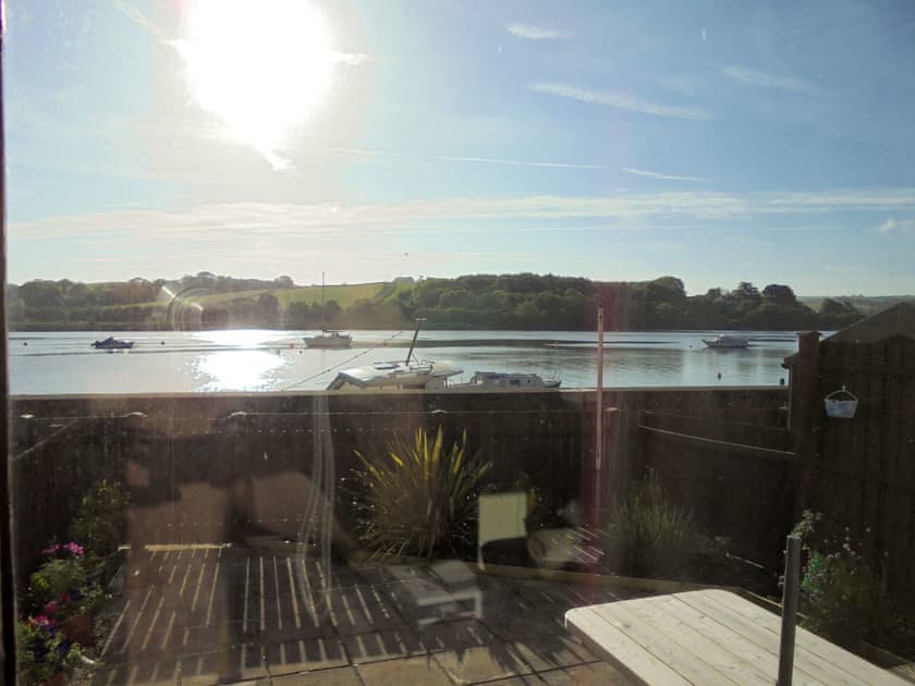 Looking through the patio doors to the river | Riverside Mews, Bideford