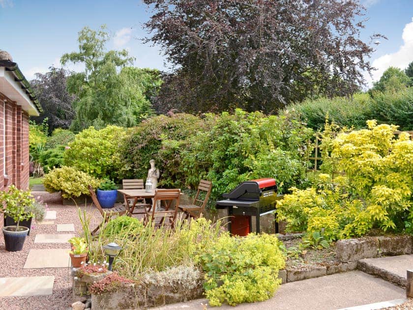 Garden with dining area and BBQ | The Old Post Office, Ruckhall, Eaton Bishop, near Hereford