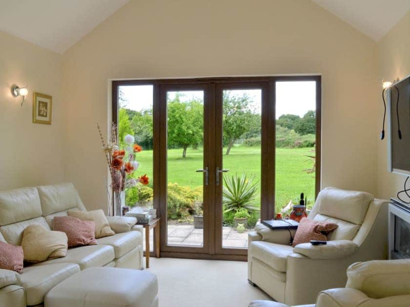 Light, airy, open plan living/dining room/kitchen | Moorland Lodge, Holt Wood, near Wimborne