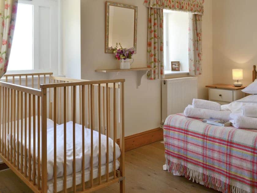 Useful cot in second double bedroom | Mole End - Libbear Barton, Shebbear, near Bude