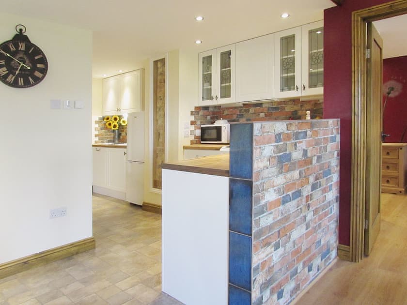 Compact and modest kitchen area | Sedge Lodge - Wood Fen Lodges, Little Downham, near Ely