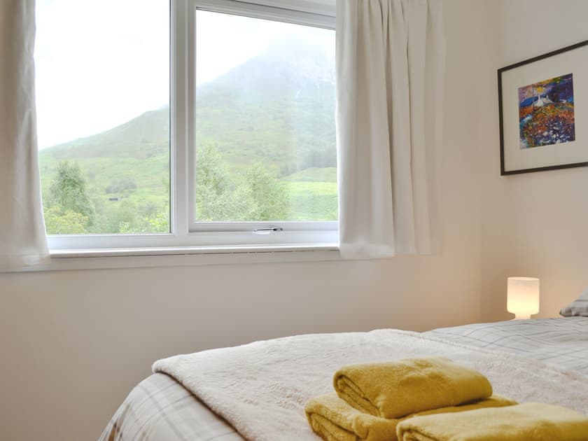 Great views from the double bedroom | Larch Cottage, Ballachulish, near Fort William