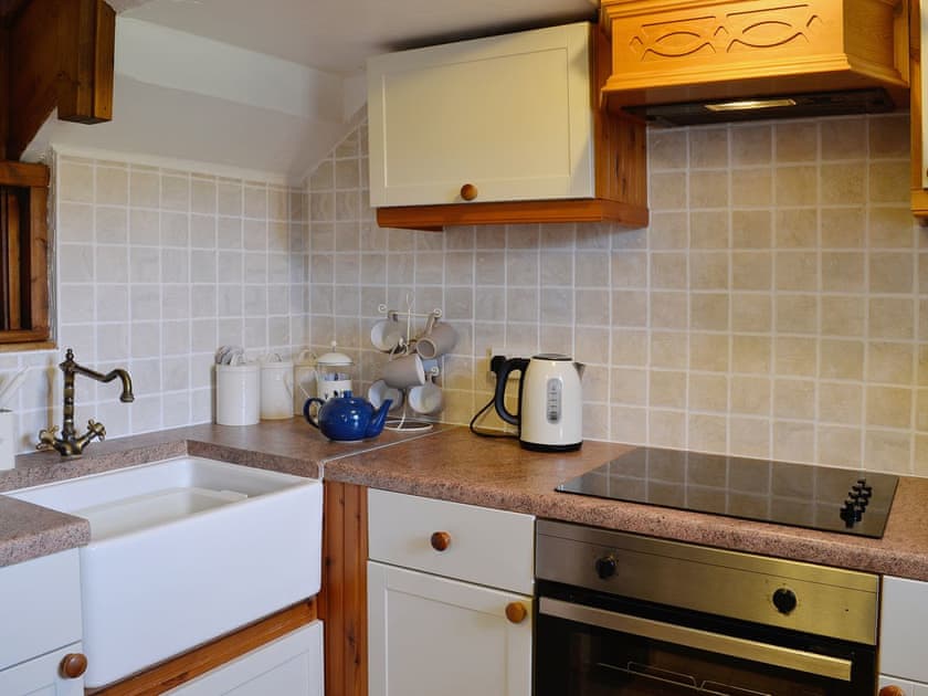 Well decorated kitchen with Belfast sink | Woodside Cottage, Nether Bellandy, Glenrinnes, near Keith