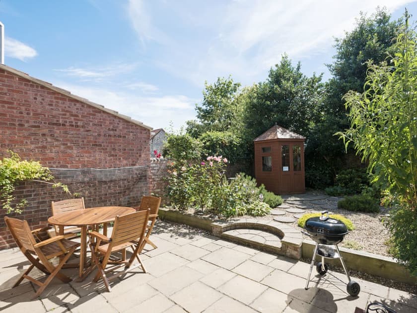 Peaceful, enclosed courtyard garden with patio  | Camelot, Weybourne, near Holt
