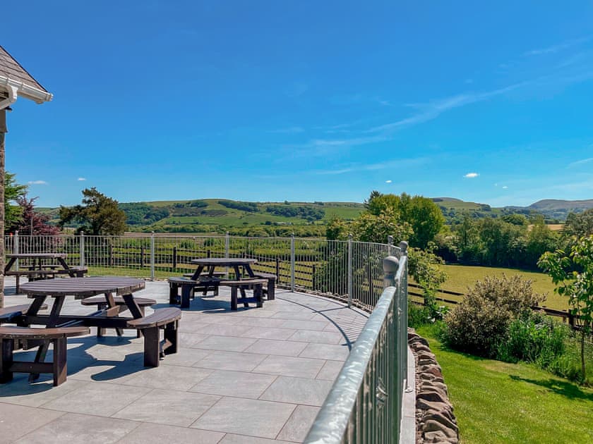 Large patio and lawned garden with wonderful countryside views  | Neuaddlas Country House, Tregaron, near Aberystwyth