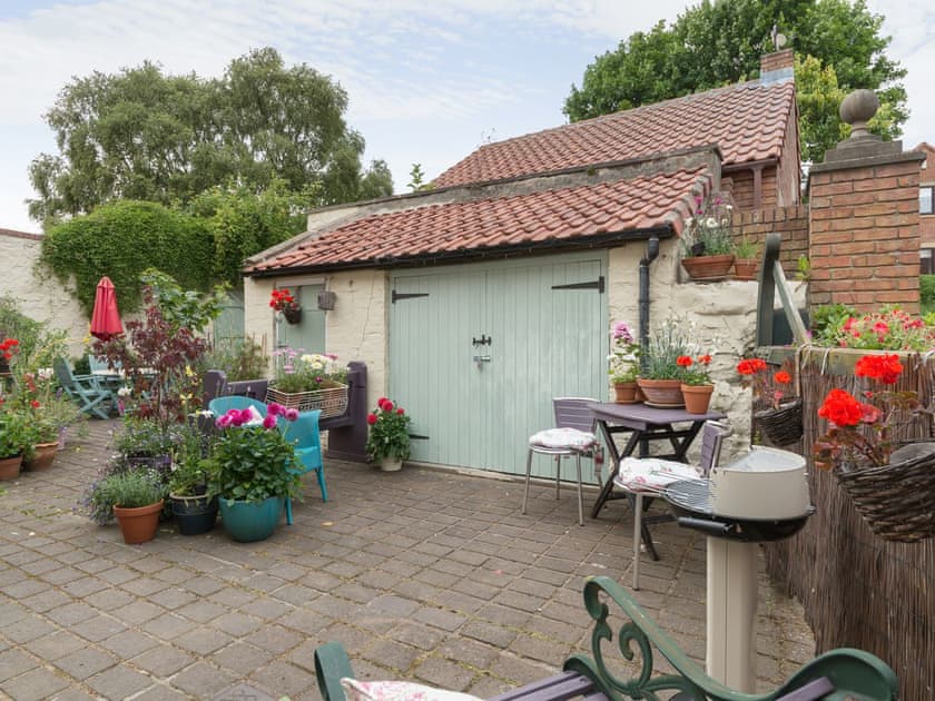 Rear courtyard with outdoor seating | Brewery House Cottage, Bishop Middleham, near Durham