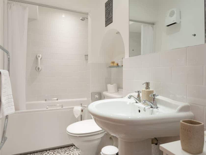 Family bathroom with shower over bath | Stable Corner - Lower Elsford Farm, Lustleigh, near Bovey Tracey