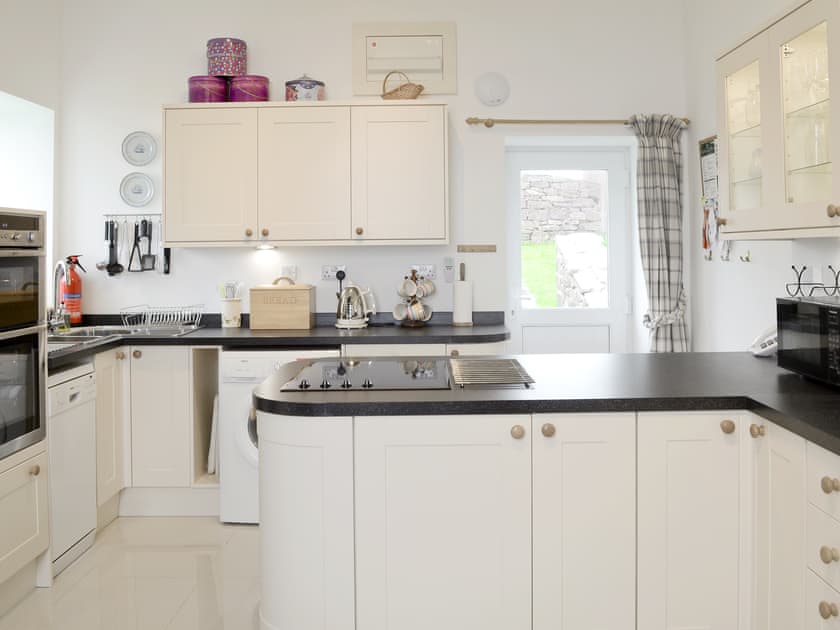 Well-equipped, modern fitted, farmhouse-style kitchen/dining room | The Old School House, Applecross