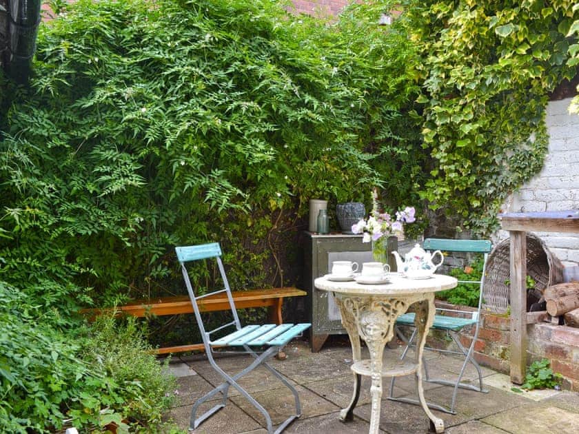 Patio area with outdoor furniture | Friary Cottage, Ludlow