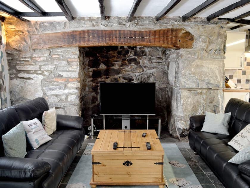 Cosy living room/ kitchen, beamed ceiling | Pendref, Trawsfynydd, near Blaenau Ffestiniog