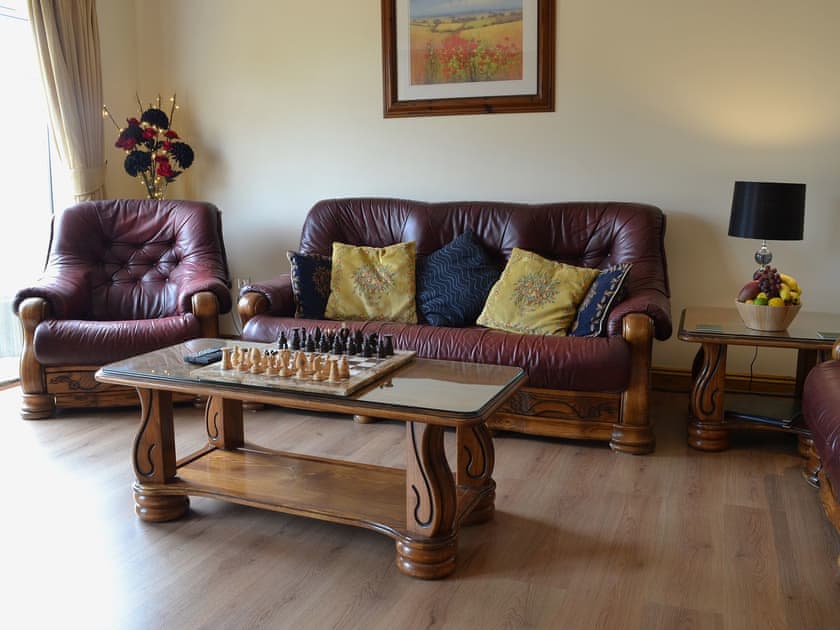 Comfortable leather furniture | Sedge Lodge - Wood Fen Lodges, Little Downham, near Ely