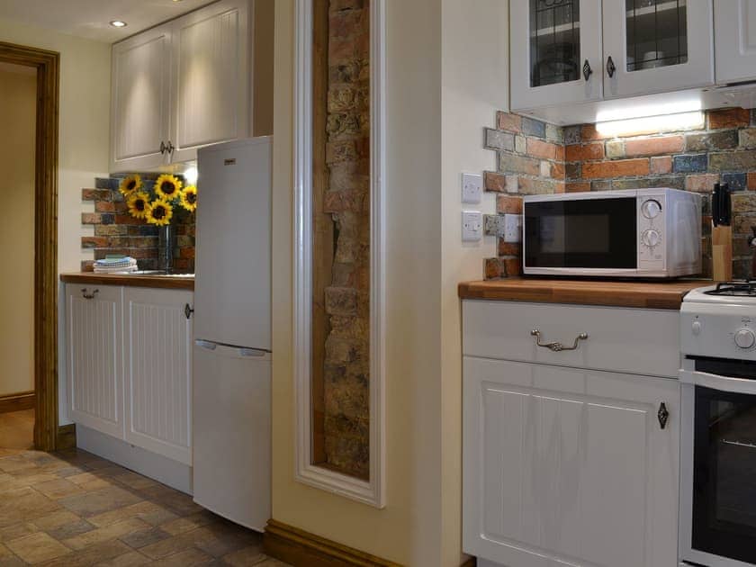 Lovely kitchen retaining original features | Sedge Lodge - Wood Fen Lodges, Little Downham, near Ely