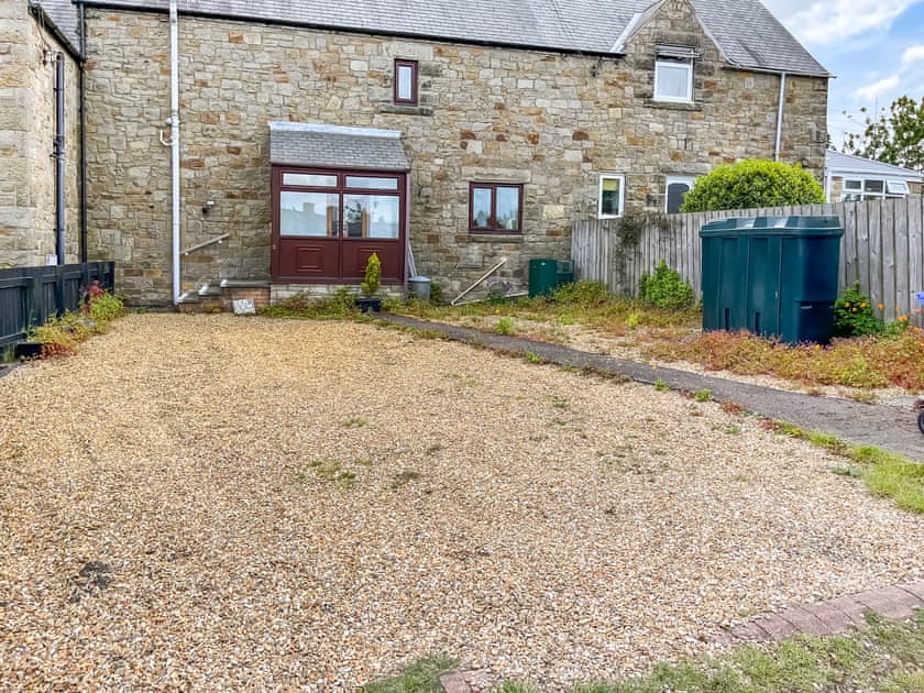 Three steps to back door entrance with handrail and summer wild flowers | Sea View, Shilbottle, near Alnwick
