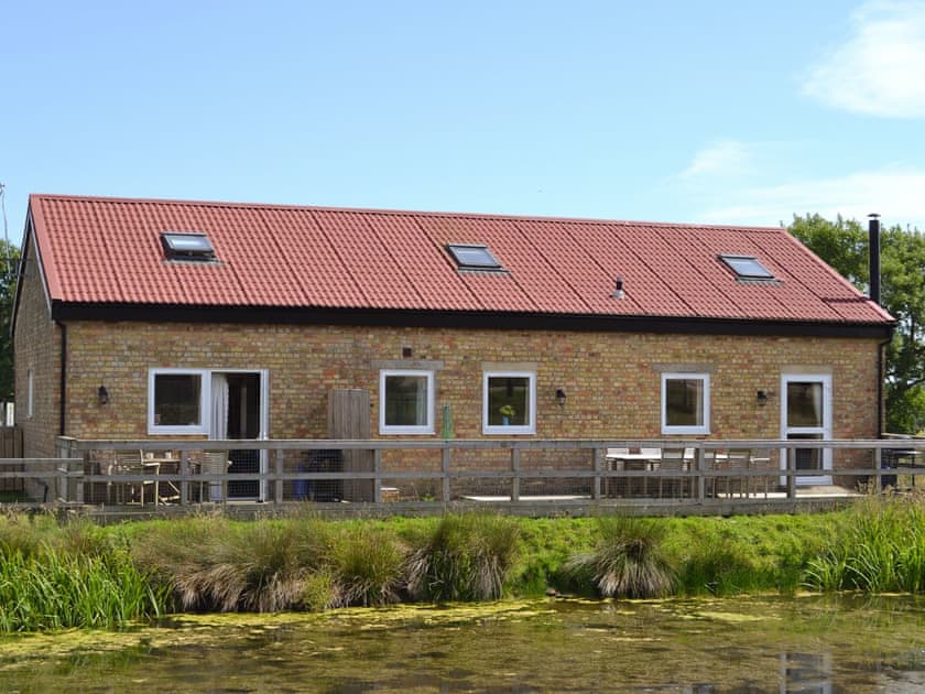 Charming semi detached properties located next to a pond | Romney Cottages, Peasmarsh, nr. Rye