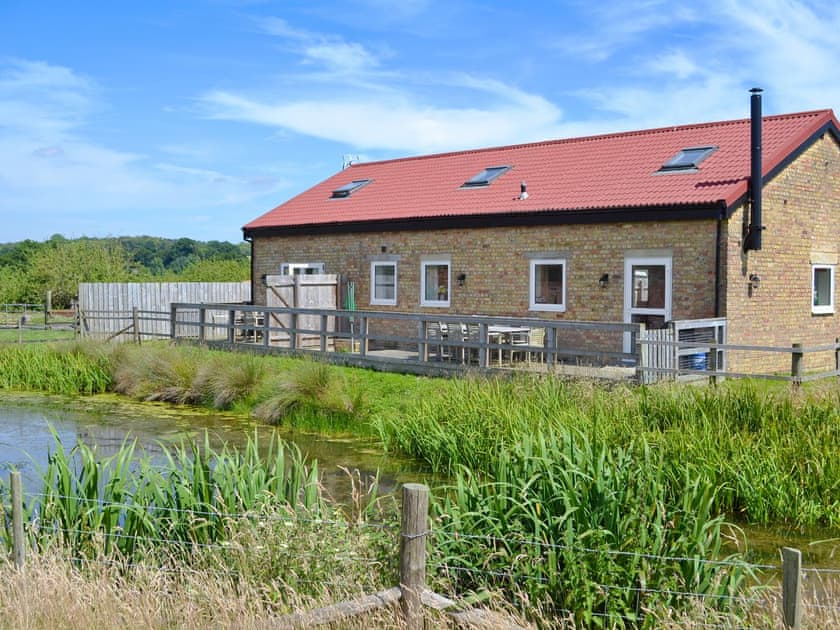 Charming semi detached properties located next to a pond | Romney Cottages, Peasmarsh, nr. Rye