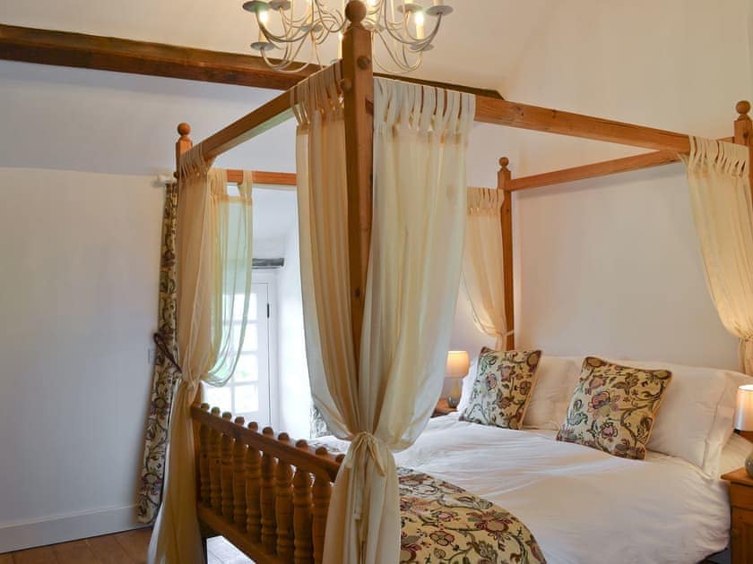 Four poster bedroom | Ty Newydd, Llwyngwril, near Aberdovey