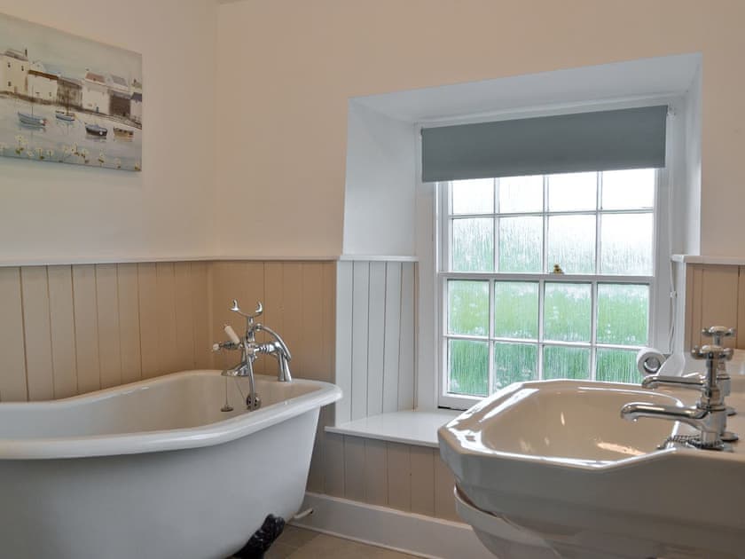 Bathroom with roll-top bath | Ty Newydd, Llwyngwril, near Aberdovey